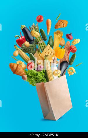 confezione con prodotti livellanti su sfondo blu Foto Stock
