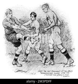 Una scena dalla partita di rugby Inghilterra/Galles nel Campionato delle cinque Nazioni 1914, disputata a Twickenham, che ha portato ad una vittoria nel 10-9 per l'Inghilterra. Qui, il giocatore gallese George Hirst elude i giocatori inglesi Lowe e Chapman per segnare un goal di caduta di trova. Data: 17 gennaio 1914 Foto Stock