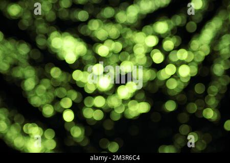 sfondo colorato con anelli bokeh illuminati in modo diverso Foto Stock
