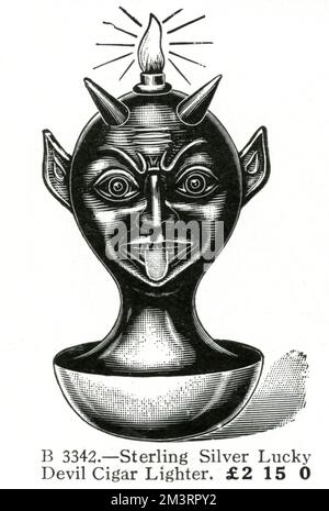 Regalo di Natale - accendisigari Lucky Silver Devil 1909 Foto Stock