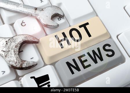 Scrittura di testo Hot News. Soggetto fotografico concettuale che sperimenta una popolarità crescente sui social media Foto Stock