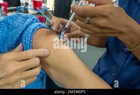 Domanda di vaccinazione Foto Stock