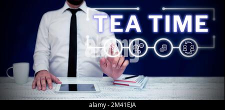 Scrittura con visualizzazione del testo Tea Time. Business approccio il tempo nel pomeriggio, quando alcune persone mangiano un piccolo pasto Foto Stock
