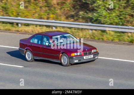 1994 90s novanta Red BMW 316 316I TRGLX 1596cc benzina 4 spee automatico; viaggiando sull'autostrada M6 UK Foto Stock
