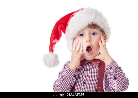 Buon bambino ragazzo con cravatta e sospende in tessuto Babbo Natale, concetto di Natale Foto Stock