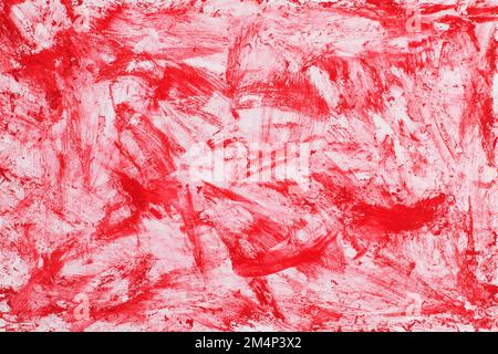 Sfondo astratto con macchie di un pennello rosso su bianco. Foto Stock