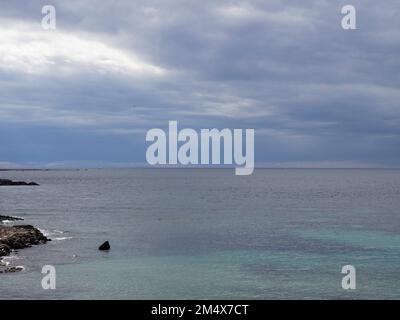 Luce tempestosa sul mare, Gallipoli, Puglia, Italia Foto Stock