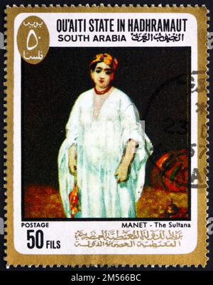 YEMEN meridionale QUAITI STATO IN HADHRAMAUT - CIRCA 1967: Un francobollo stampato nello Yemen meridionale Quaiti Stato in Hadhramaut mostra la moglie del Sultano, Pittura Foto Stock