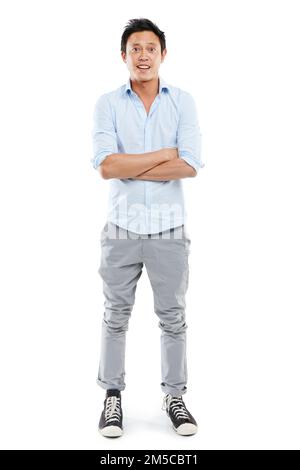 Affrontare la vita con fiducia. Studio ritratto di un bel giovane uomo che si posa con fiducia su uno sfondo bianco. Foto Stock