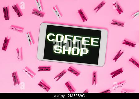 Cartello di testo che mostra il Coffee Shop. Parola per un piccolo ristorante informale che serve caffè e spuntini leggeri Foto Stock