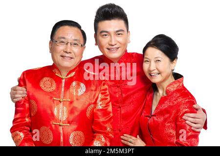 Felice famiglia di abbigliamento del Capodanno cinese Foto Stock