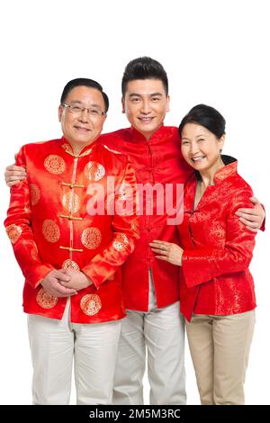 Felice famiglia di abbigliamento del Capodanno cinese Foto Stock