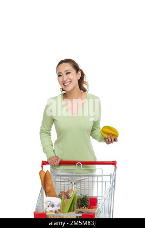 Porta i giovani amanti spingere carrello shopping Foto Stock