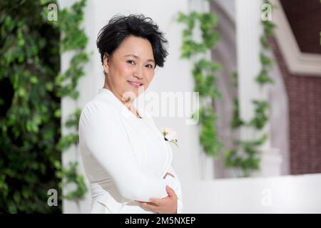 Donna degna di mezza età Foto Stock