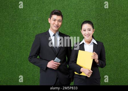 La gente di affari di erba Foto Stock