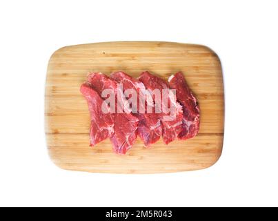 Carne di prima qualità si incontrano in diversi tagli di filetto su un tavolo di legno. Foto Stock