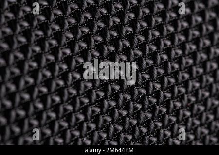Fondo tessuto nero di fili intrecciati. Foto Stock
