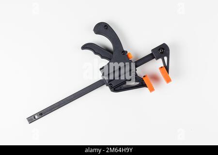 Moderno morsetto a barra con dorso bianco isolato a sgancio rapido Foto Stock