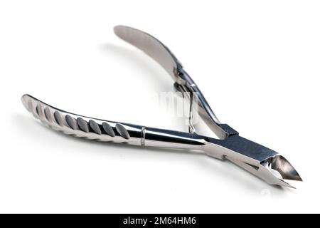 Pinze per manicure su fondo bianco. Foto Stock