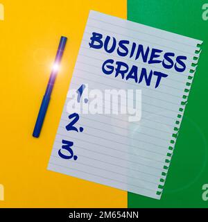 Scrittura a mano segno Business Grant. Parola per le strategie di lavoro compire gli obiettivi Foto Stock