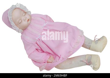 Bambola antica in abito rosa Foto Stock