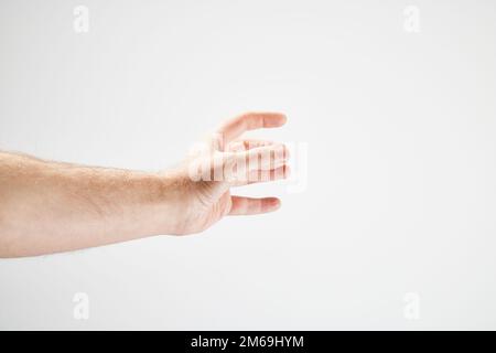 Mano maschile di fronte a sfondo bianco Foto Stock