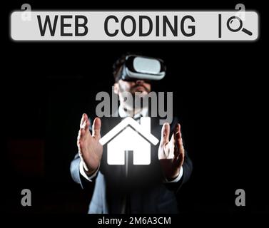 Didascalia di testo con codifica Web. Parola per lavoro coinvolto nello sviluppo di un sito web per Internet Foto Stock