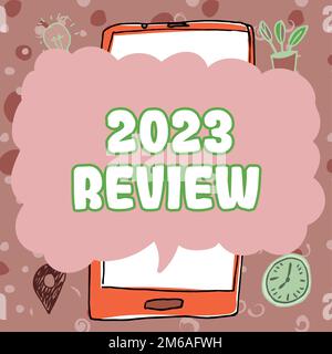 Scrittura di testo visualizzato 2023 Revisione. Parola scritta sulla visualizzazione di eventi o azioni importanti che hanno fatto l'anno precedente Foto Stock