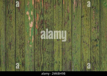 Verticale verde vintage vernice textured intemperie parete pannello in legno scheggiato per texture sfondo in qualsiasi scena astratta Foto Stock