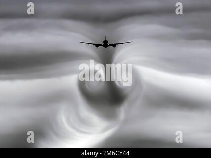 La turbolenza delle nuvole lasciate dall'aereo durante Foto Stock