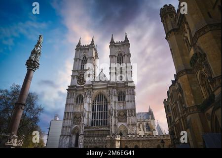 Tramonto sull'Abbazia di Westminster a Londra, Regno Unito Foto Stock