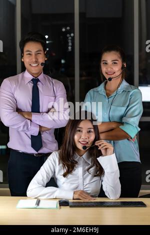 Team del call center Ritratto di notte Foto Stock