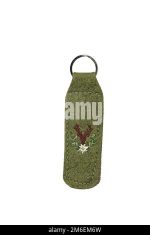 Portachiavi di varie forme, figure su sfondo bianco. Regalo per Natale, Pasqua, San Valentino, Vacanza Foto Stock