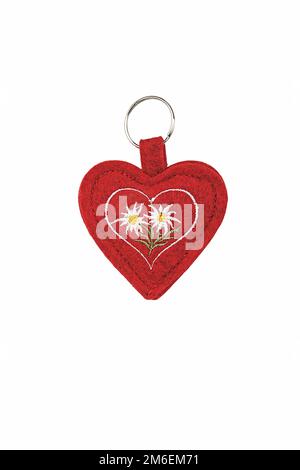 Portachiavi di varie forme, figure su sfondo bianco. Regalo per Natale, Pasqua, San Valentino, Vacanza Foto Stock