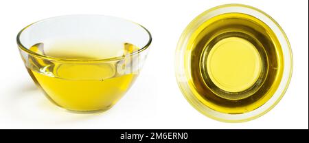 Olio di girasole in ciotola trasparente di vetro isolata su fondo bianco. Foto Stock