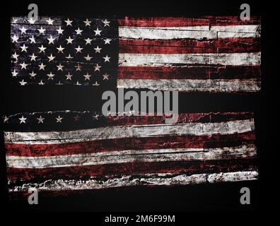 Angosciato bandiera americana spaccata in mezzo ob sfondo nero Foto Stock