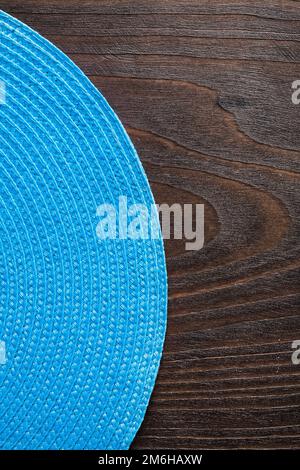 tappetino rotondo in legno vintage con vista verticale. Foto Stock