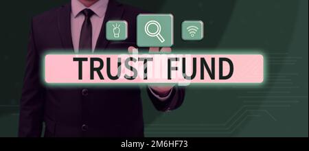 Scrittura con testo Trust Fund. Denaro di concetto aziendale detenuto dai fiduciari per i beneficiari Foto Stock