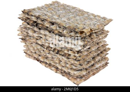 Pane piatto di segale svedese isolato su sfondo bianco Foto Stock