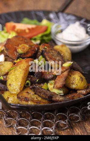 Groestl di patate tirolese in padella Foto Stock