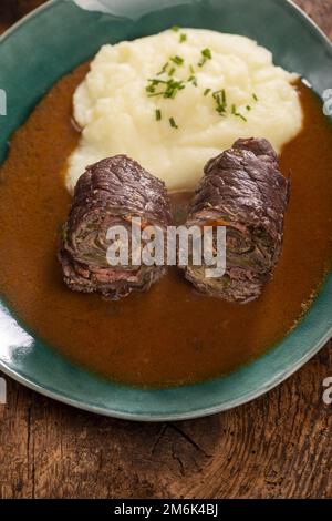 Involtini di carne con purè di patate Foto Stock