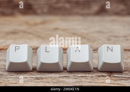 Tasti della tastiera del computer disposti per scrivere la parola DEL PIANO Foto Stock