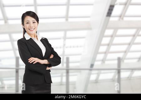 Una giovane donna di affari Foto Stock