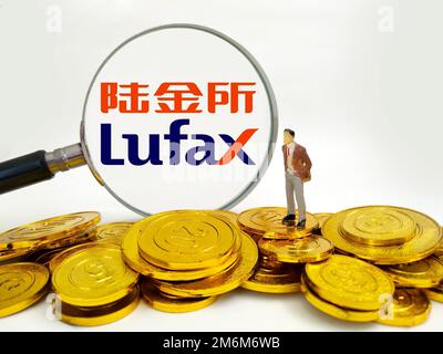 SUQIAN, CINA - 5 GENNAIO 2023 - Illustrazione: Lufax Hong Kong esce dal commercio al dettaglio, 5 gennaio 2023, Suqian, Jiangsu, Cina. Foto Stock
