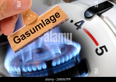 Il supplemento del gas è stampato su un timbro di legno Foto Stock