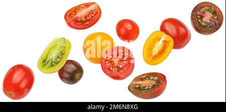 Pomodori ciliegini colorati cadenti isolati su sfondo bianco Foto Stock