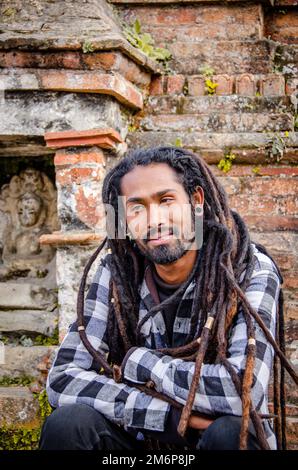 Volti di Nepa: Giovane uomo adulto con Dreadlocksl Foto Stock