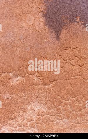 Immagine astratta della parete arancione grunge sfondo texture per la decorazione d'interni. Foto Stock