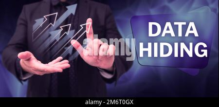 Segno di testo che mostra l'occultamento dei dati. Word scritto su incorporazione segreta dei dati nelle immagini grafiche e in altri tipi di file Foto Stock