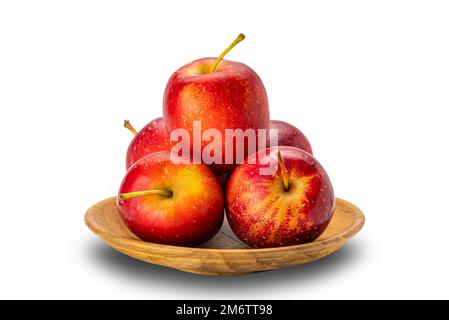 Mazzo di mini mele fresche mature e croccanti in un piatto di legno. Foto Stock